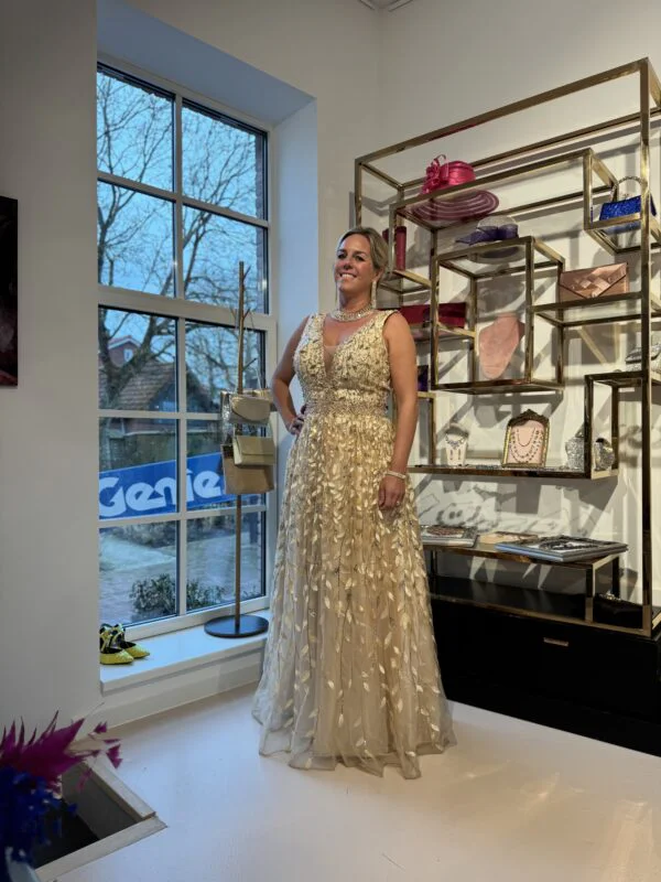 Gouden jurk met parels en pailletten