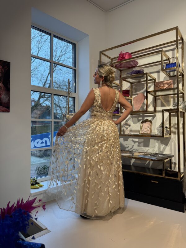 Gouden jurk met parels en pailletten