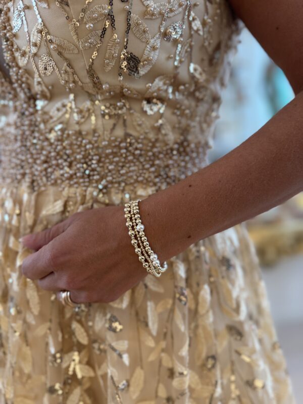 Gouden jurk met parels en pailletten