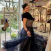 Donker blauwe avondjurk met goud en tule